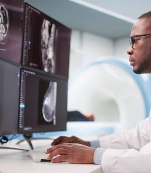 Doctor,Performing,Breast,Cancer,Screening,And,Tumor,Diagnosis,Before,Surgery.